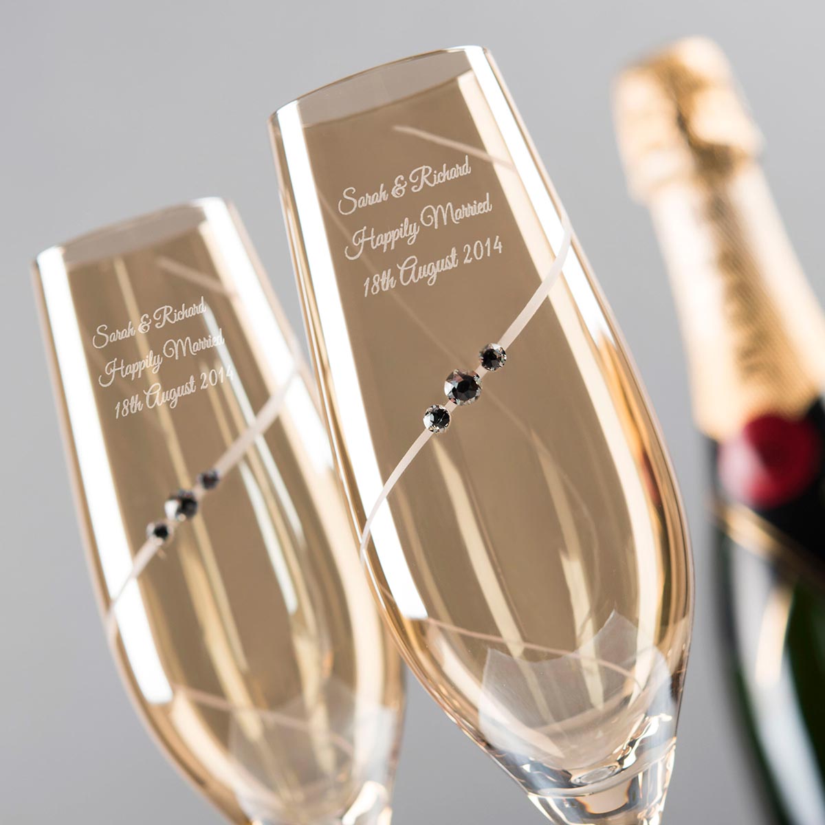 Engraved Set of Two Amber Champagne Flutes embellished with Crystals -  Includes Laurent Perrier Champagne