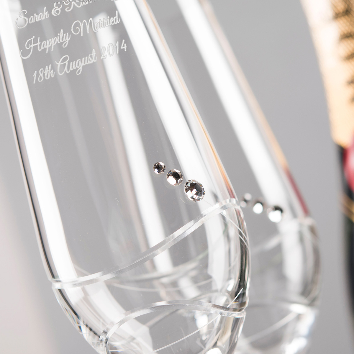 Engraved Set Of Two Champagne Flutes embellished with Crystals - includes Laurent Perrier Champagne - Swirls